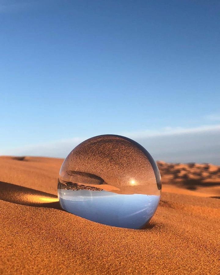 Sahara Majestic Luxury Camp Hotel Merzouga Exterior foto A lensball in the desert