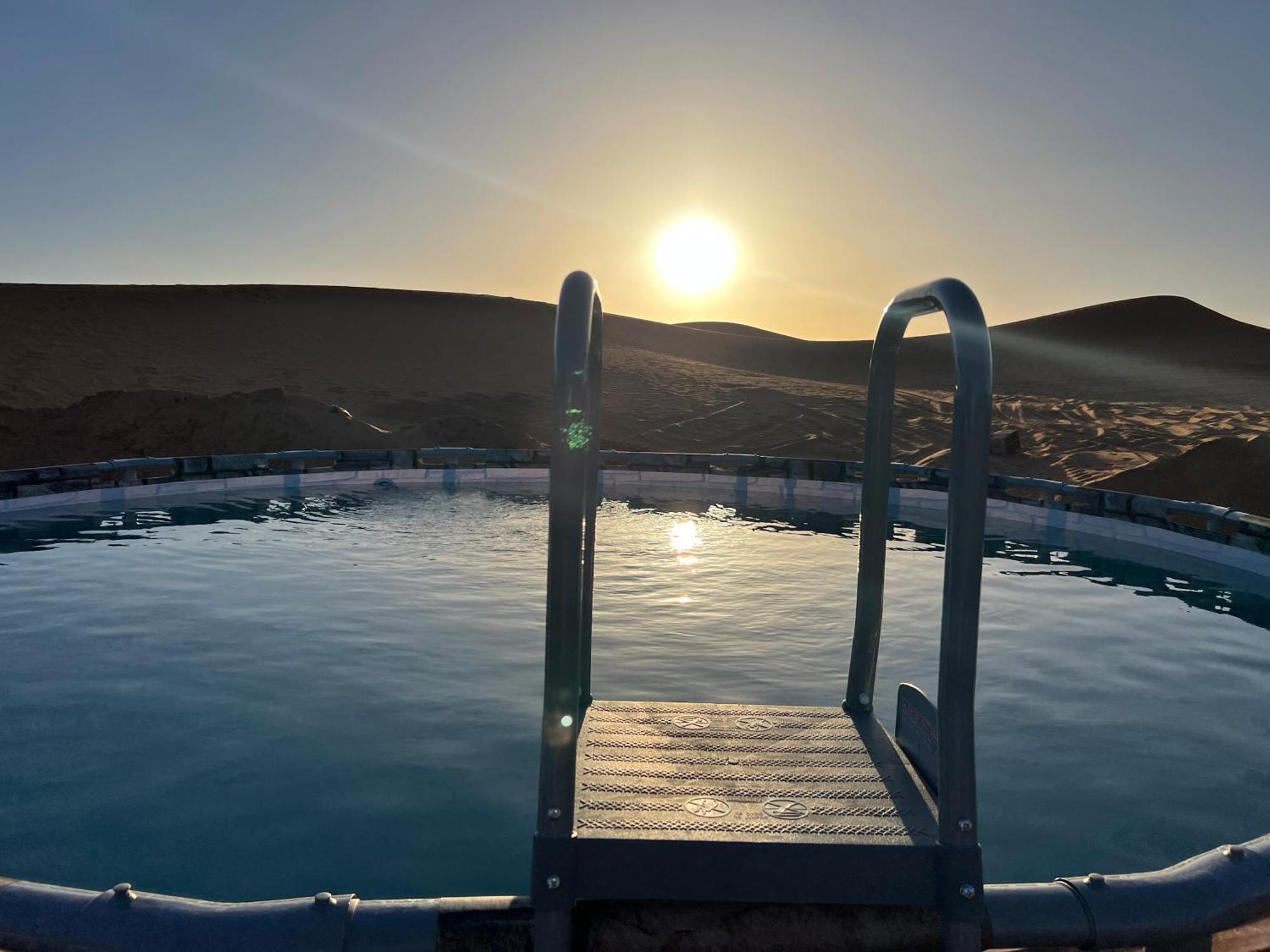 Sahara Majestic Luxury Camp Hotel Merzouga Exterior foto Sunset at the Blue Lagoon